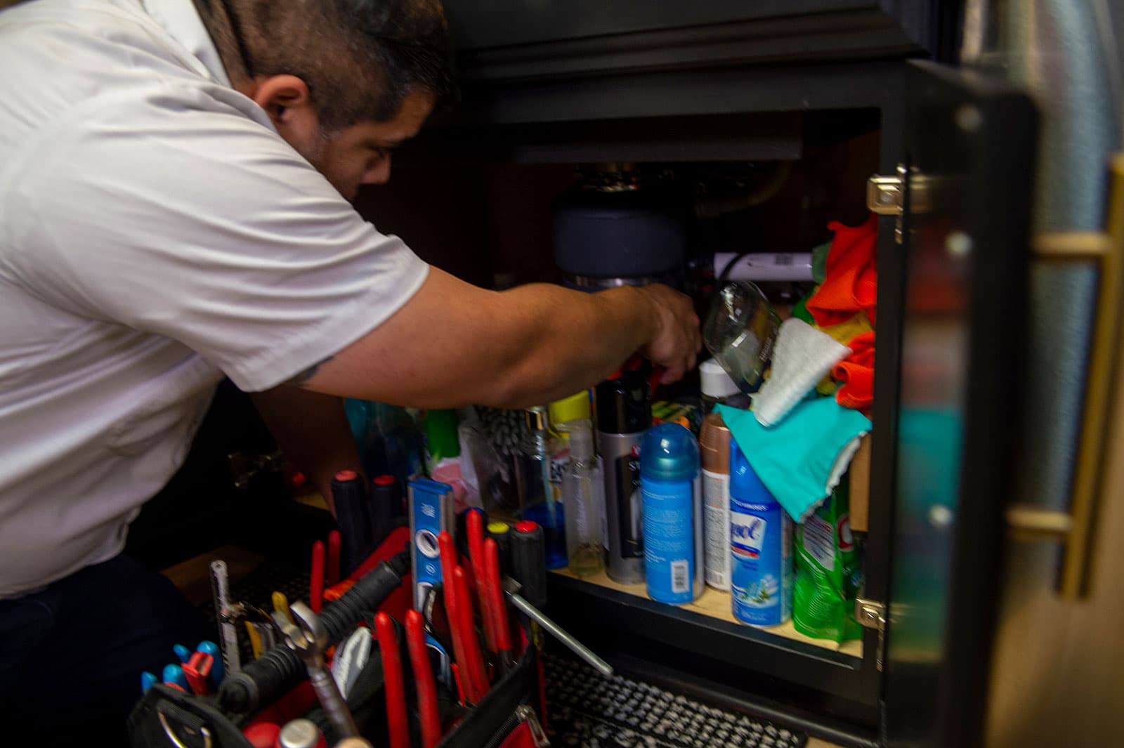 A bluefrog Plumbing + Drain plumber stocking a service van